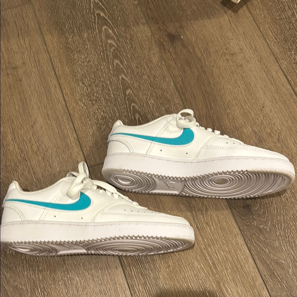 Nike Air Forces with Blue Swoosh